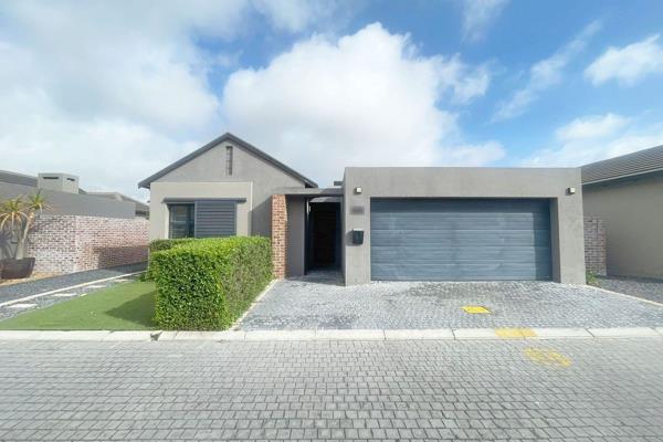 This modern 3-bedroom home is situated within a secure estate, offering both comfort and convenience. 
The property features a spacious ...