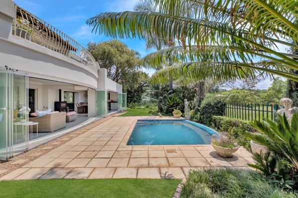 This exquisitely appointed 4 bedroom home with views of the Bryanston Golf Course offers ...