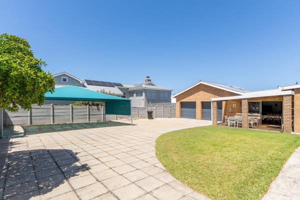 Experience the ultimate in seaside living with this beautifully maintained 4-bedroom ...