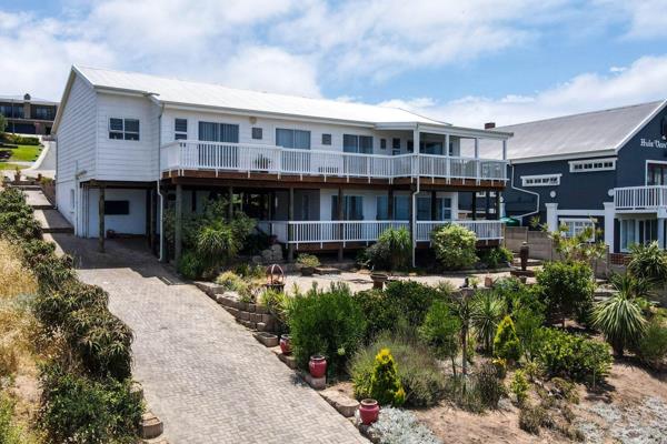 Discover this standout freehold property nestled in the serene coastal town of Tergniet, Mossel Bay. Positioned at 8 Snoek Street, this ...