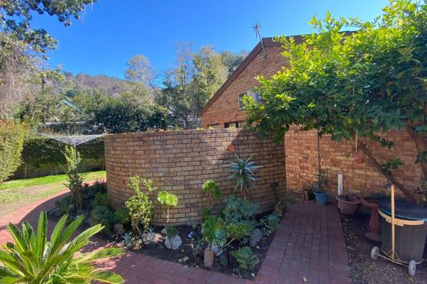 Nestled in the picturesque neighborhood of Paarl Central West, this charming face brick ...