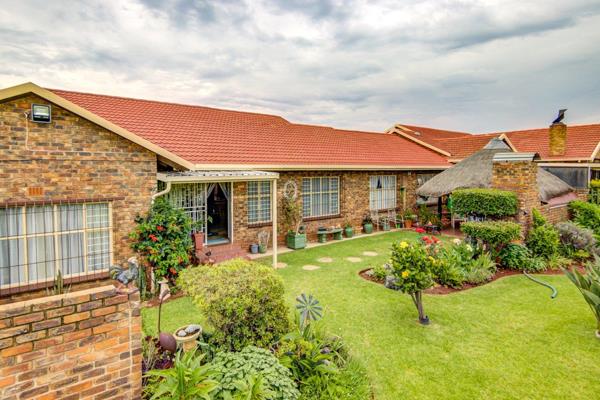 Welcome to this lovely facebrick townhouse with it&#39;s neatly tiled entrance, large ...