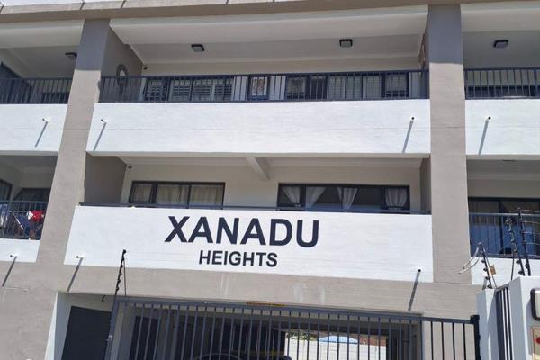 This modern 2-bedroom duplex, located on the second floor of Xanadu Heights, 14 North ...