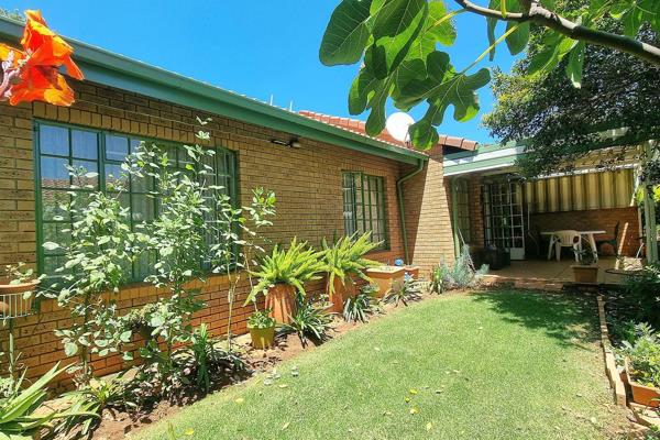 This beautifully positioned unit boasts a spacious open-plan dining and lounge area that ...