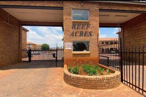 This spacious 2-bedroom, ground-floor apartment in Krugersrus at Reef Acres offers ultimate peace of mind within a secure 24-hour ...