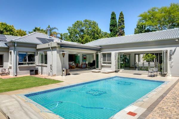 This modern 4-bedroom home is designed for seamless indoor-outdoor living, featuring open-plan interiors filled with natural light. ...