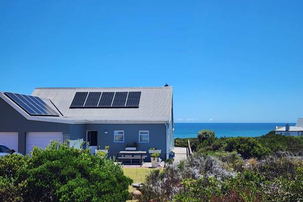 Discover your own slice of seaside paradise in this exquisite 2-bedroom, 2-bathroom home nestled within Grotto Bay&#39;s exclusive ...