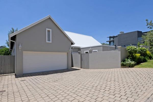 This enchanting 4-bedroom home is a perfect blend of timeless modern farmhouse and contemporary design. 

Step inside and be greeted by ...