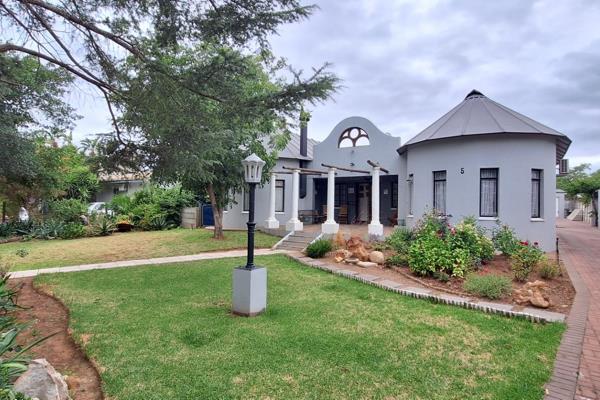 EXCLUSIVE MANDATE: Situated in a sought-after neighborhood of Robertson, this unique and ...