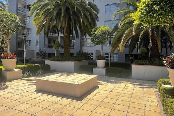 Sandton executive 2 bedroom apartment in Sandhurst Towers. Ground floor apartment with sliding french doors out to lovely outdoor ...