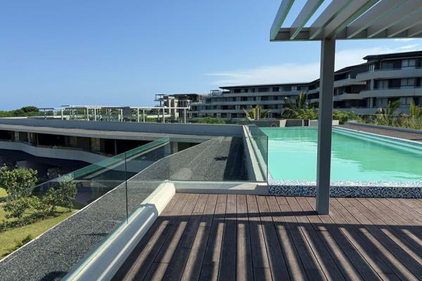 The 2-bedroom, 2-bathroom apartment in Pebble Beach, Sibaya, offers a luxurious and ...