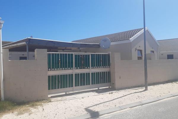 This property offers 2 parking bays under cover behind a secure gate. When entering you ...