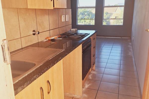 Discover this charming 2-bedroom, 1-bathroom apartment located in the heart of Kempton Park CBD, conveniently situated behind the ...