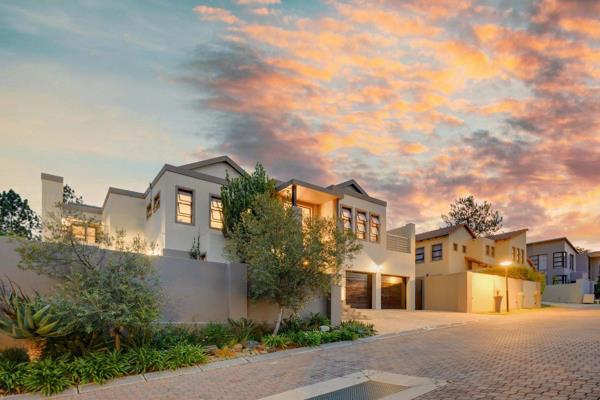 As you arrive, a picturesque entrance framed by charming olive trees and a grand ...