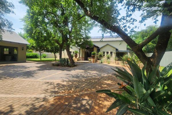 This exquisite property, set on 4,197sqm of land, offers luxury, space, and modern convenience in a tranquil estate.

The home features ...