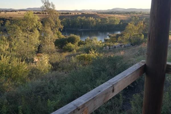 Discover the perfect opportunity to own a piece of serene paradise with this vacant land, offering breathtaking views of the Vaal ...