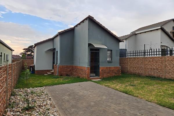 Set within a secure gated community, this modern two-bedroom home offers a harmonious ...