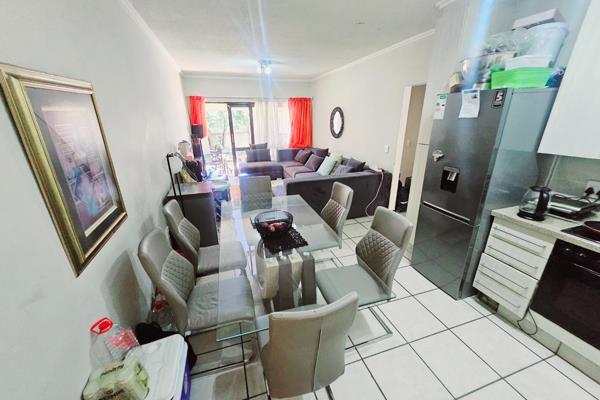 This charming ground-floor apartment offers a perfect blend of modern convenience and ...