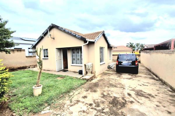 Three bedroom, two bathroom home | neat kitchen | large garden | loads of driveway ...