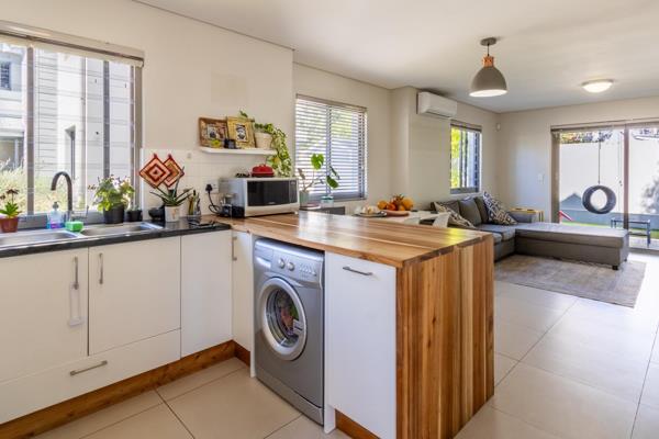 Secure complex with controlled access situated right opposite Paarl Boys Primary School.
Spacious open plan living room with ...