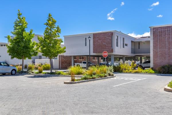 Secure complex with controlled access situated right opposite Paarl Boys Primary School.
Spacious open plan living room with ...