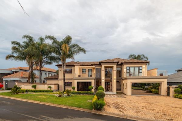 A home that perfectly balances elegance and functionality, this residence greets you with remarkable curb appeal. Picture-perfect ...