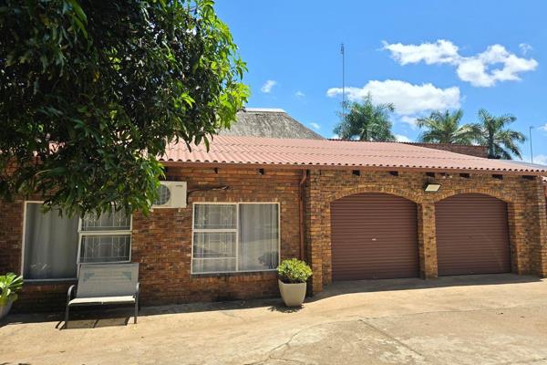 This extremely spacious townhouse is located in an upmarket area in Tzaneen.

The property features a sparkling pool, entertainment ...