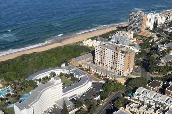 Excellent value in this spacious triplex (on three levels) with 3 bedrooms and 3 bathrooms right on the beach in Umhlanga. 
There are  ...