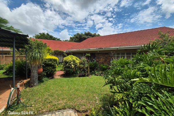 Located near Protea Park Primary School, this magnificent property boasts:

Main House
- 4 spacious bedrooms with modern built-in ...