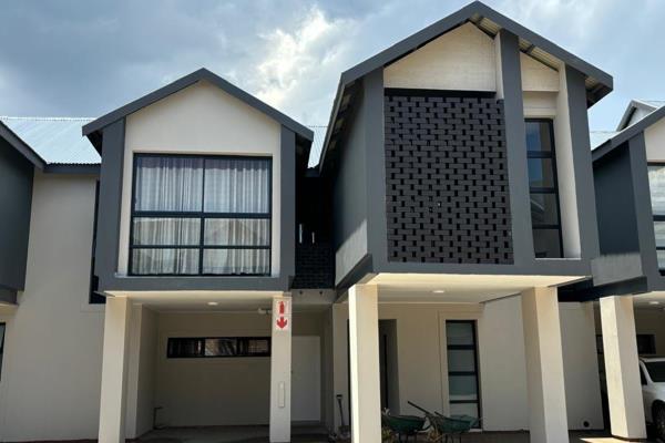 Exterior &amp; Entryway:
The townhouse features a sleek, contemporary fac&#184;ade with a combination of smooth render, glass. A ...