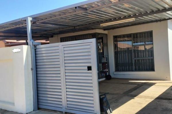 This georgeous home offers a 3 bedrooms, 2 bathrooms, beautifully laid sitting area.
Fitted kitchen, 2 open carports, neately tiled home.
Bedrooms have built-in cupboards and it is paved outside.

Call us for viewing.