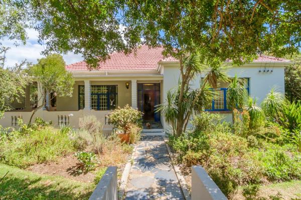 Step into a piece of Cape Town history with this beautifully restored 1930s farmhouse ...