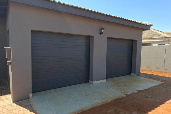 Discover modern living with comfort and electric security fence in mind in this newly built 3-bedroom, 2-bathroom home, perfectly ...