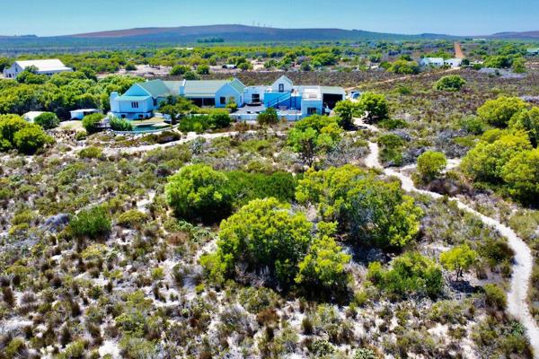 Expansive 10ha Fynbos Retreat with Endless Possibilities

Nestled in the picturesque Yzerfontein rural area, this 10-hectare ...