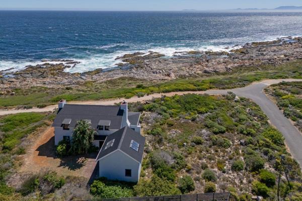 Pam Golding Properties Exclusive Mandate.
Nestled on the water’s edge of Pringle Bay ...