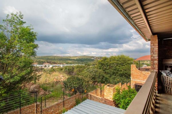 Nestled in the sought-after suburb of Noordheuwel, this exceptional double-storey cluster home is a rare find. 
Designed for the view ...