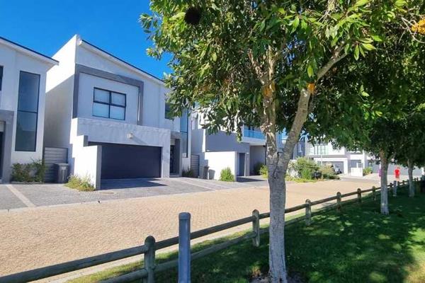 Step into a home that blends modern comfort with family-friendly charm. This three-bedroom, two-bathroom haven is thoughtfully designed ...