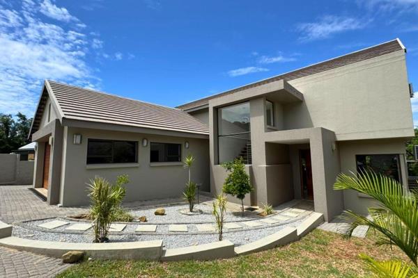 This stunning, contemporary double-storey home is situated in a highly sought-after, secure estate, offering both luxury and ...