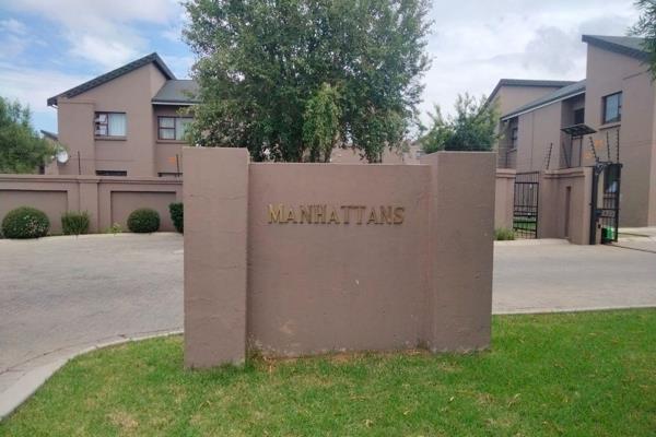 Fully tiled ground floor unit with open plan lounge, kitchen, 2 bedrooms, full bathroom ...