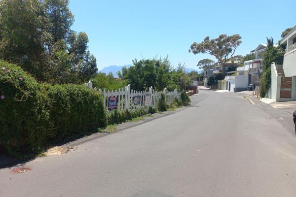 This undeveloped plot is nestled in a peaceful, established neighborhood in Gordon&#39;s Bay Village. The property boasts complete ...