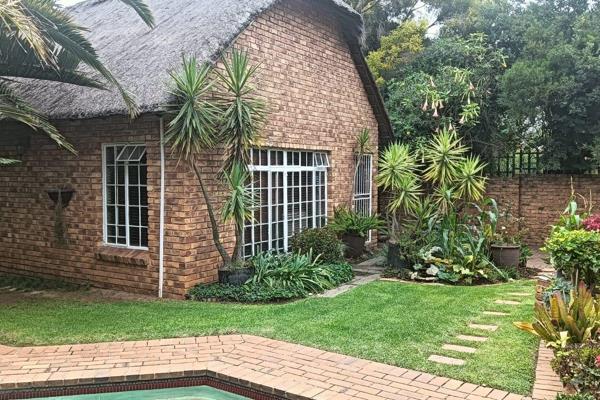 This lovely Fully-Furnished Garden Cottage that is securely nestled on a beautiful property, which is situated in the near vicinity of ...