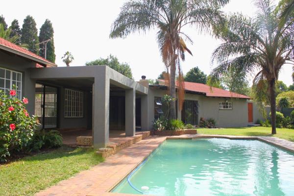 Spacious with stylish kitchen, large family and entertainment area, lavish garden and income producing 1x bedroom cottage or space for ...