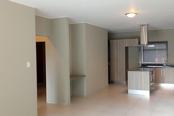 Modern open plan 2 Bed 2 Bath on the 1st floor at The Atrium in Rivonia, offering:

- ...