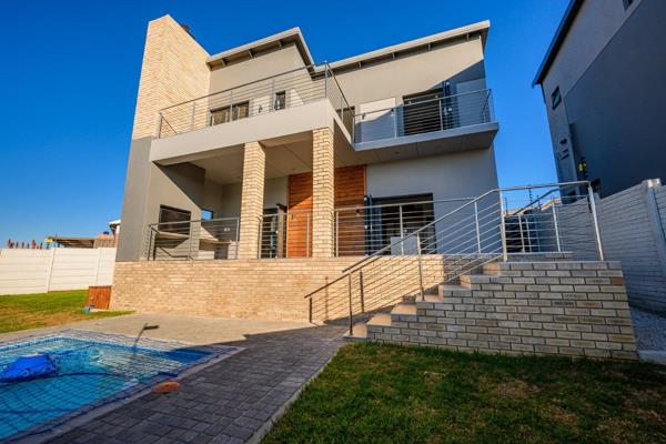 Welcome to this luxurious modern home, designed for those who love open-plan living and ...