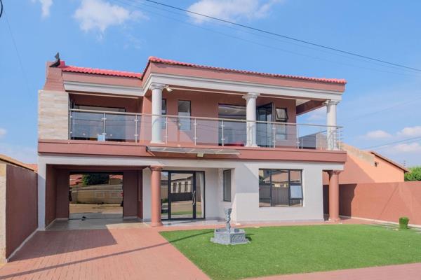 View by Appointment: We present a magnificent 5-bedroom property in the heart of Protea Glen, offering the perfect blend of luxury ...