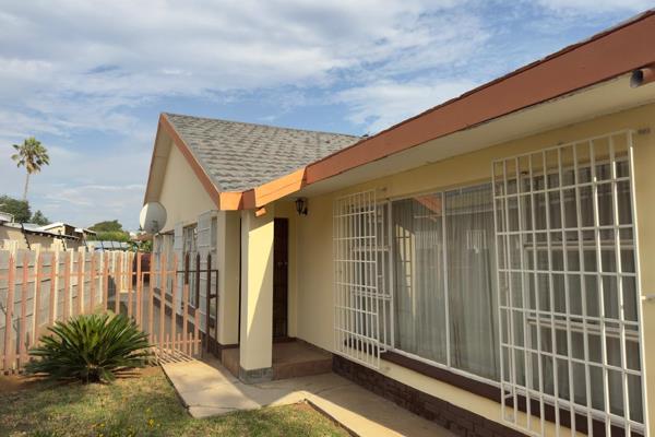 Picture perfect home with SOLAR INSTALLATION. This is a home with much more space than the average home size in Lichtenburg. Situated ...