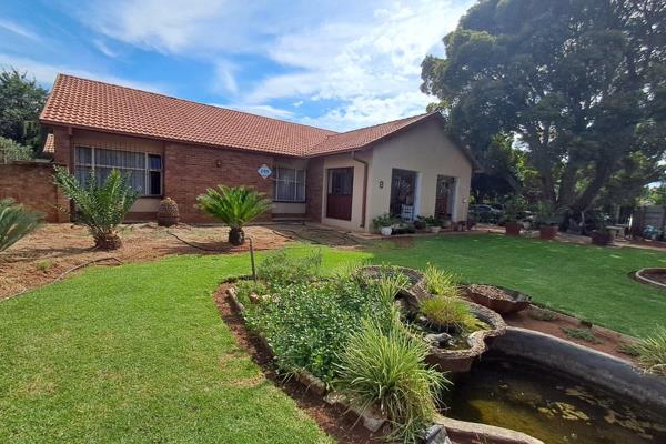 Low-maintenance facebrick property. The entrance leads you to a spacious and well-appointed kitchen, complete with solid wood cabinets ...