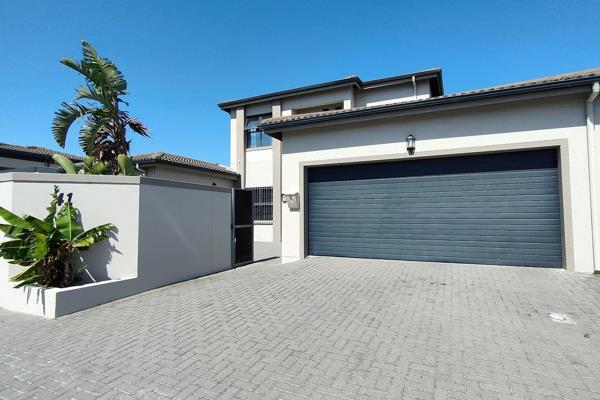 This modern home is nestled in a highly sought-after area of Parklands North, offering the perfect blend of luxury and functional ...