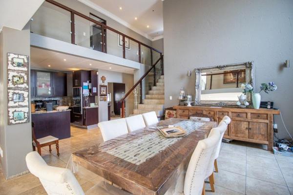 Nestled in a sought-after secure estate, Bushwillow Park, this stunning double-story ...