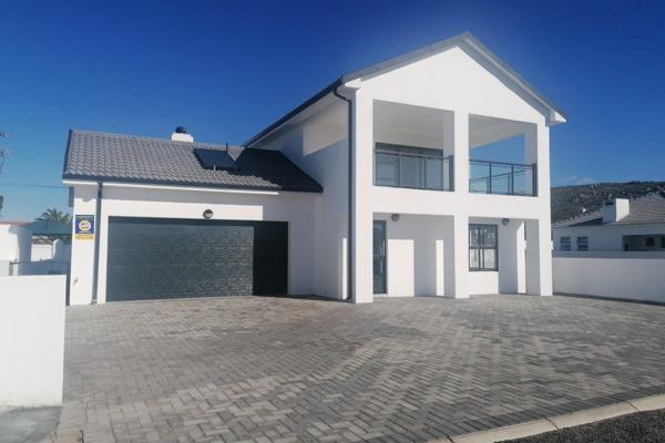 This lovely and spacious home is ideally located in Sandy Point Beach Estate, just a ...